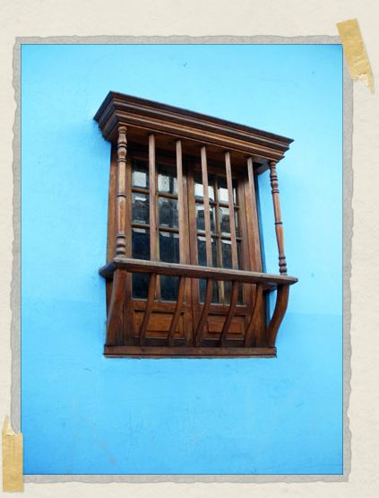 'The bright blue houses were always the first to catch my eye during our walks through town