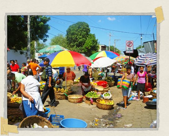 'The colorful market next to one of the major bus stations in Leon