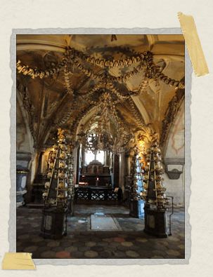 'The center of the ossuary, where a massive bone chandelier hangs from the ceiling