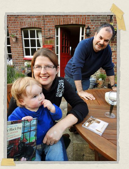 'Finley, Becky, and Andy, relaxing in their beautiful back garden