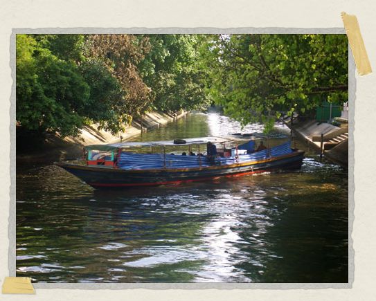 'Our favorite river taxi – the one we took nearly every day while in Bangkok – turning around after dropping us off not far from our hotel