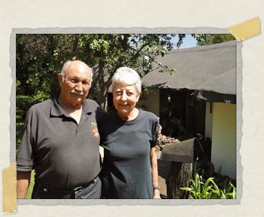 'Henry and Berna, in front of their cottage at Rainhill Farm