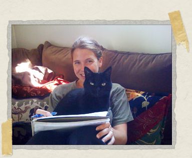 'Our cat China, helping Jessica do a bit of research on South Africa